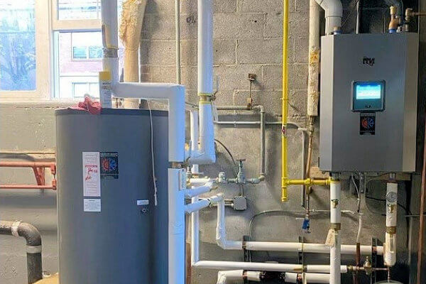 Prestige technician performing a furnace replacement for a homeowner in Cornwall NY