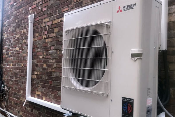 Prestige technician performing a AC installation for a homeowner in Goshen NY