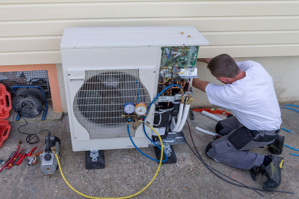Prestige technician performing a furnace replacement for a homeowner in Goshen NY