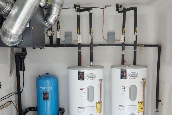 Prestige technician performing a furnace replacement for a homeowner in Pine Bush NY