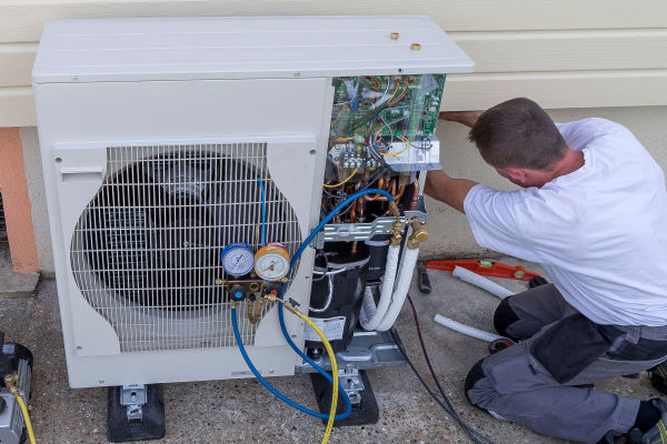 Prestige technician performing a furnace replacement for a homeowner in White Plains NY