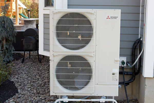 Prestige technician performing a AC installation for a homeowner in Yorktown NY